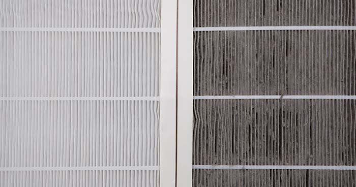 Image: a clean and dirty air filter side by side.